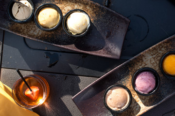 People enjoying food hands getting food serving food eating at a restaurant with friends eating