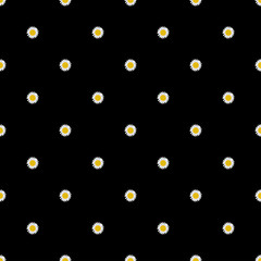 Seamless pattern with small daisies on a black background.