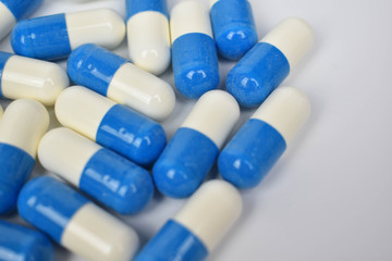 blue pills on a white