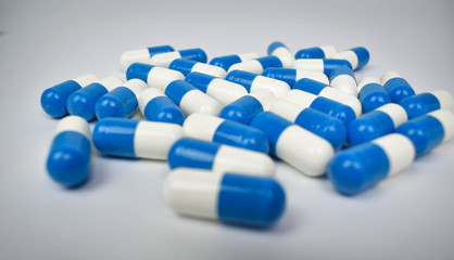 blue pills on white