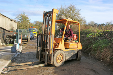 Man working in a Forklift truck	