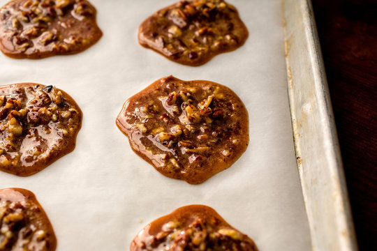 Homemade pralines on baking sheet