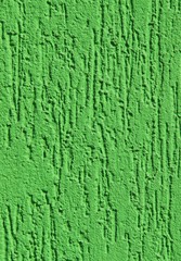 Green wall, texture, background. Plastered building wall, painted with water-based paint. Decorated surface with embossed pattern. Elements of the exterior and interior. Vertical frame