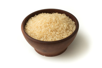 Parbolizado Rice into a bowl. Parboiled