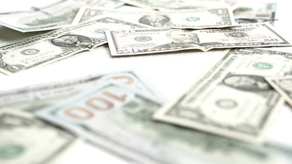 American dollars lie on a bright shiny background.High quality Dollar banknotes