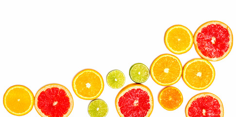 Creative sample of lime, orange and grapefruit. flat lay. Food concept. Lime orange and grapefruit on a white background