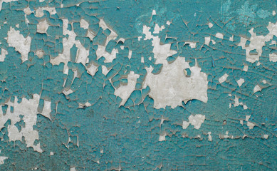Obraz premium Old painted wall with cracked paint