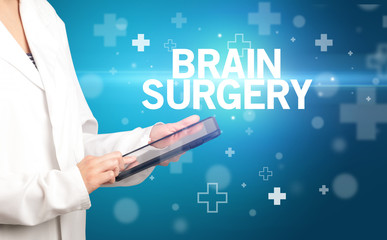 doctor writes notes on the clipboard with BRAIN SURGERY inscription, first aid concept