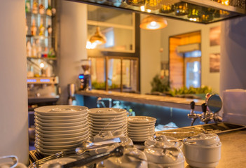 Clean dish on bar counter in modern restaurant