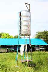 Metal vertical tank for storing water in the village
