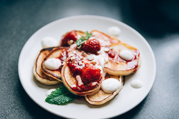 Pancakes with yogurt and strawberry jam