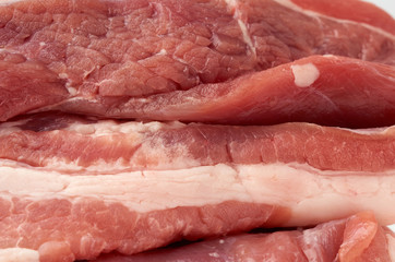 stack of pork raw meat, close up