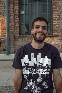Young man smiling on the street