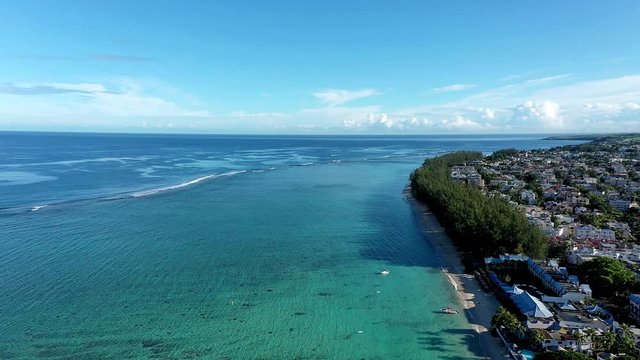 The beach at Flic en Flac  hotels and palm trees, Mauritius, Africa