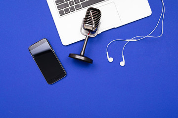 microphone for recording podcasts on a blue background for the screen saver