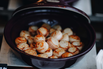 Beautifully decorated catering banquet table with different food snacks and appetizers with sandwich