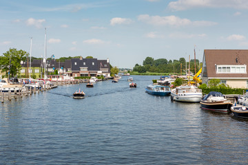 Boats in the river the Leede in Warmond the Netherlands