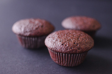 chocolate cupcakes on a dark background