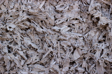 the uneven texture of wood chips