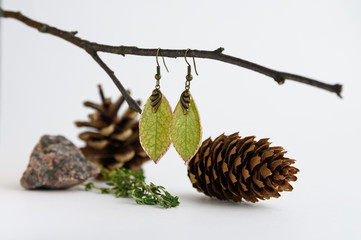 handmade earrings made of epoxy resin and plants and flowers