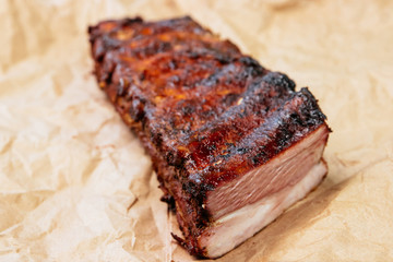 Spicy hot grilled spare ribs from a summer BBQ. Paper Kraft Background