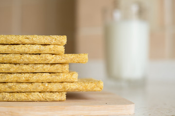 Fototapeta na wymiar Corn crispbreads on the kitchen table, selective focus.