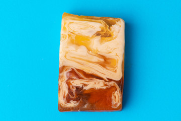 Soap for hand washing on a blue background. Close up