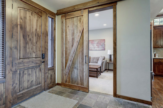 Front Door And Office Room Near Main Hallway.