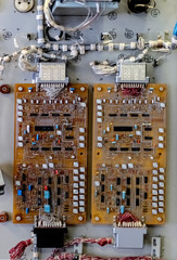 Chip boards and electronic components. Control cabinet, view from the inside. Close-up.