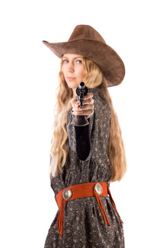 Blonde with a cowboy hat and a gun. Isolate on white background

