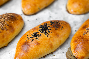 home-made sesame and black cumin pastry in the baking tray