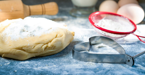 composition with dough on blue background, Cooking pastries