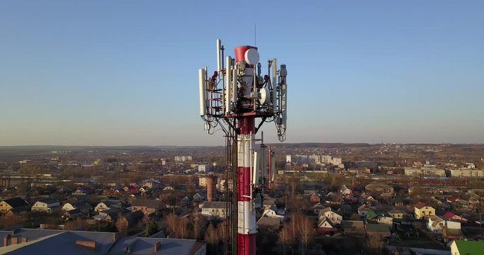Telecommunication tower of 4G and 5G cellular. Base Station or Base Transceiver Station. Wireless Communication Antenna Transmitter. Telecommunication tower with antennas against blue sky.