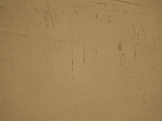 Beige background with distressed concrete wall