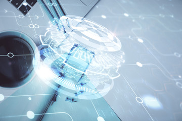 Multi exposure of data drawing hologram over topview of study desk background with computer. Concept of technology.