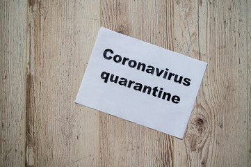 The inscription on a piece of paper quarantine coronavirus. Deadly virus announcement.