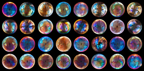 Group of soap bubbles isolated on black background.