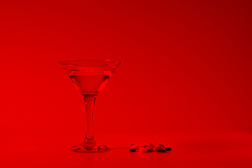 Summer coctail. Glass of water and medicin.