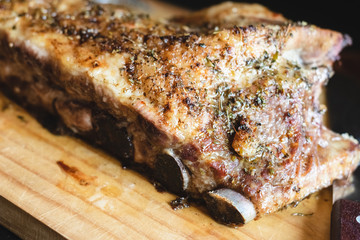 Close up Juicy homemade Pork Rib Meat on Top of Wooden Cutting Board