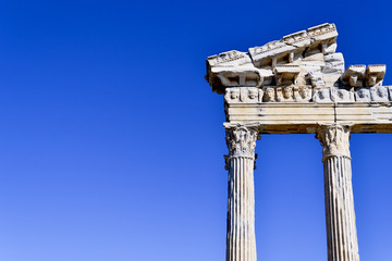 Temple of Apollo in the Old city of side, antique columns against the blue sky