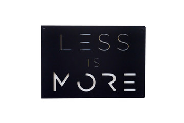 Less is more sign on white background