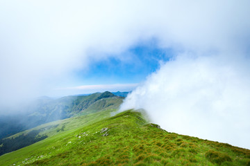 Exploring the mountains of Romania, epic landscapes and low clouds ahead