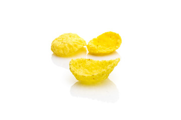 Cereals breakfast. Healthy Superfood corn flakes isolated on white background. Healthy eating, dieting and detoxication concept, space for text. Macro close-up shot.