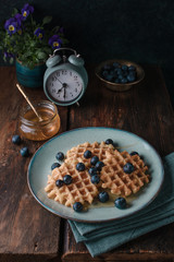 Belgian waffles with blueberry and honey