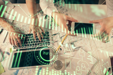 Double exposure of man and woman working together and technology theme drawing. Computer background. Top View. High tech concept.