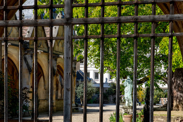 Paris, France - April 1, 2020: View of Saint Severin church garden in Paris