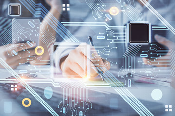 Double exposure of man and woman working together and technology theme drawing hologram. Big data concept. Computer background.