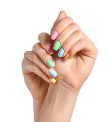 Hands of young woman with beautiful manicure on white background