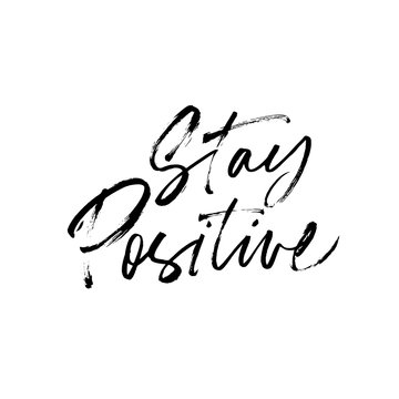 Stay positive hand drawn vector brush calligraphy. Positive, happy and optimistic lettering quote or phrase.