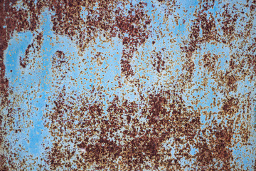 Rusty poorly painted surface.